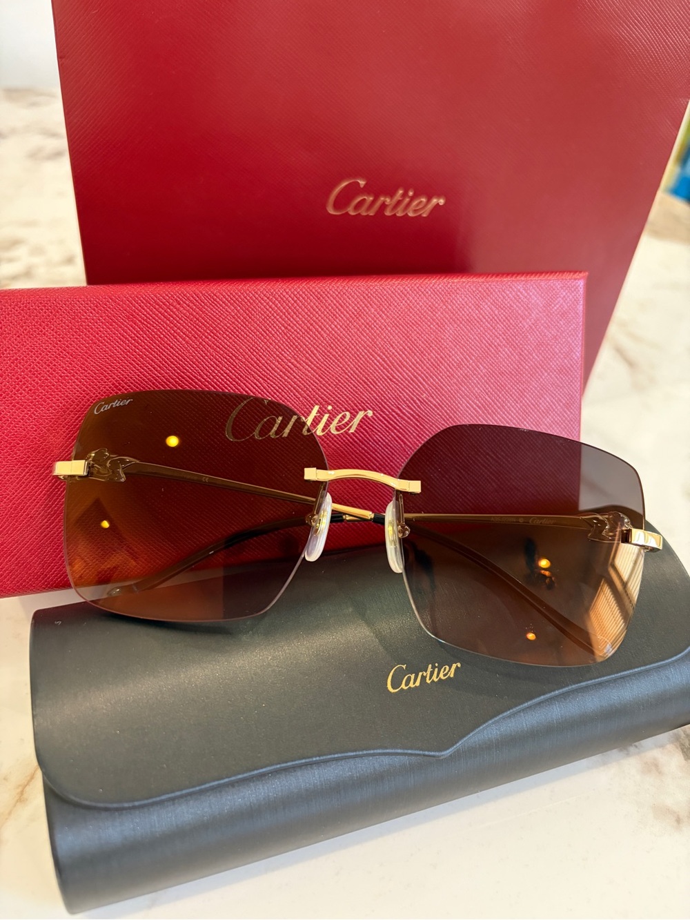 Cartier
Panthère Classic 24-Carat Gold 60MM
Sunglasses